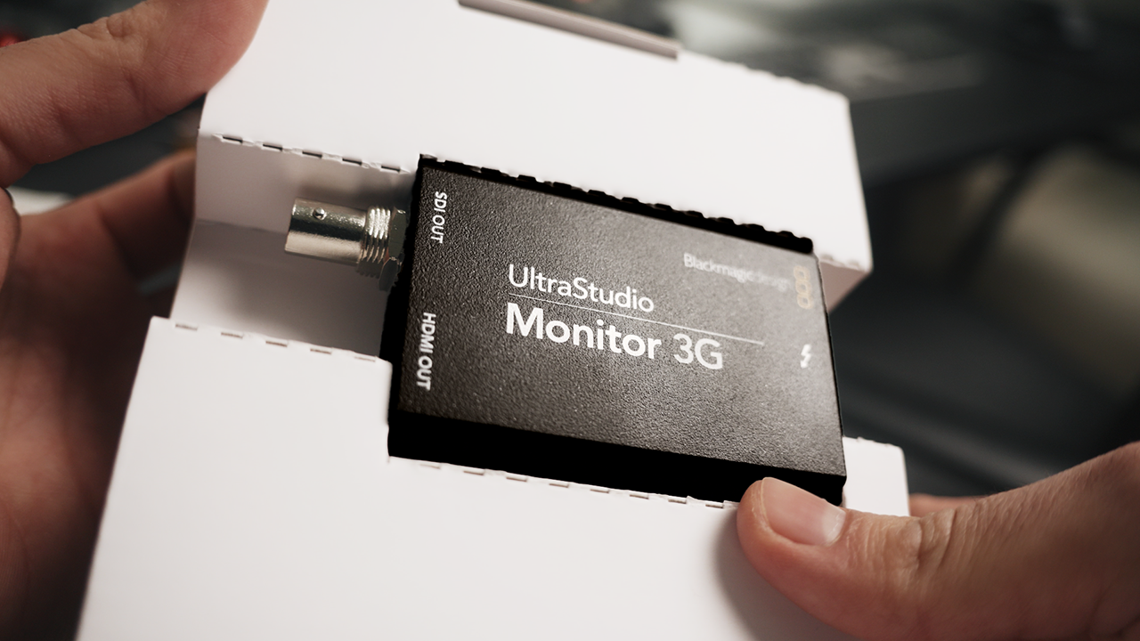 Blackmagic UltraStudio Mini Monitor connected to a color grading setup with a calibrated Eizo monitor
